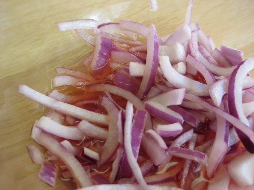 Red onions soaking in red wine vinegar
